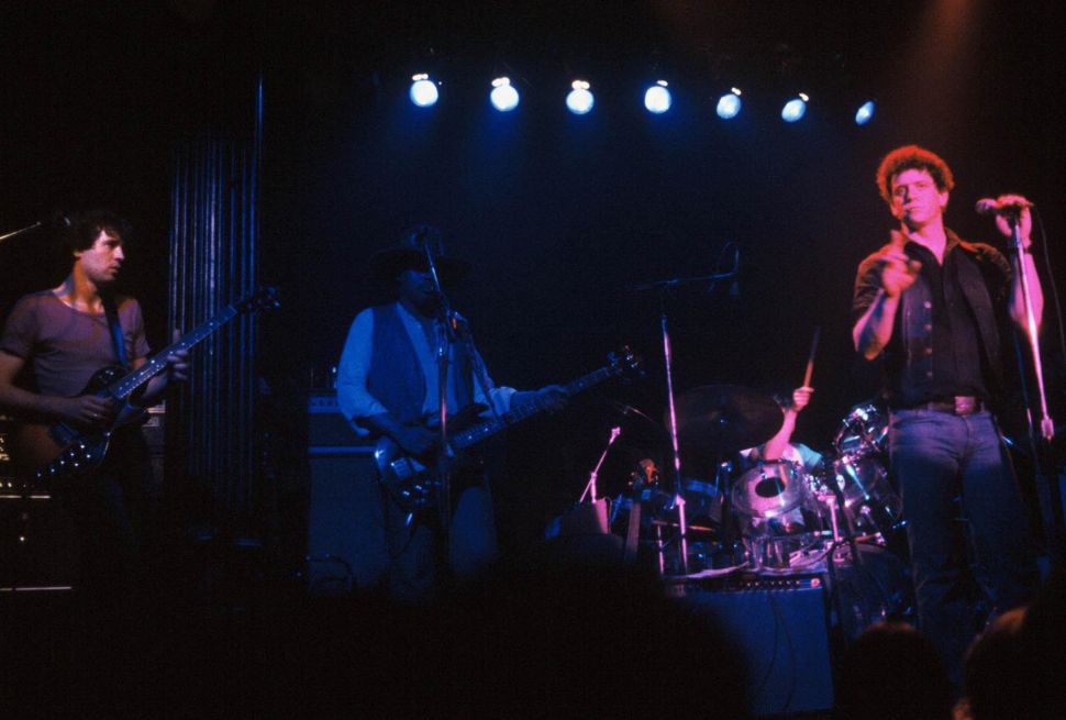 Chuck Hammer performing with Lou Reed.