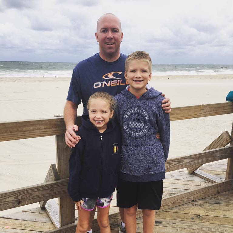 Olympic swimmer Tom Wilkens, pictured here with his two children on the Jersey Shore, looks like he could still medal today.