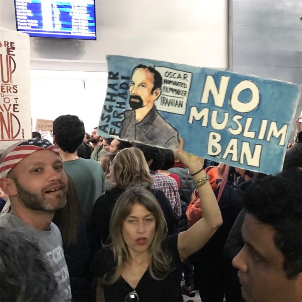 The picture was taken by Ahmad Kiarostami at #nobannowall protests at SFO international airport on January 28, 2017. Ahmad Kiarostami is the son of award-winning Iranian auteur, Abbas Kiarostami, who died in July 2016.