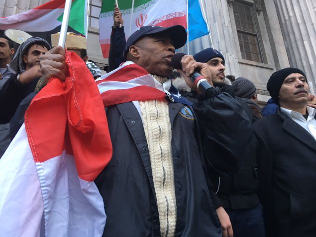 Brooklyn Borough President Eric Adams speaks at a rally of Yemeni bodega owners against President Donald Trump's Muslim travel ban.