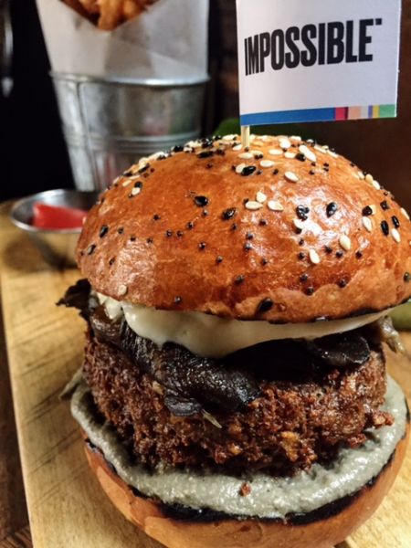 The burger featured at Public, the first Michelin-starred restaurant to serve the meat from Impossible foods.