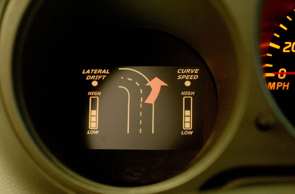The speedometer of a car at the Turner-Fairbank Highway Research Center in McLean, Va, is outfitted with a system that warns drivers if they are drifting between lanes or approaching a curve too quickly.