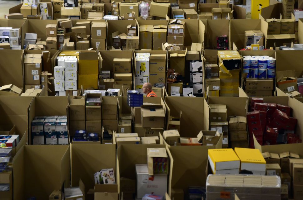 An employee works at the Amazon electronic commerce company's logistics center.