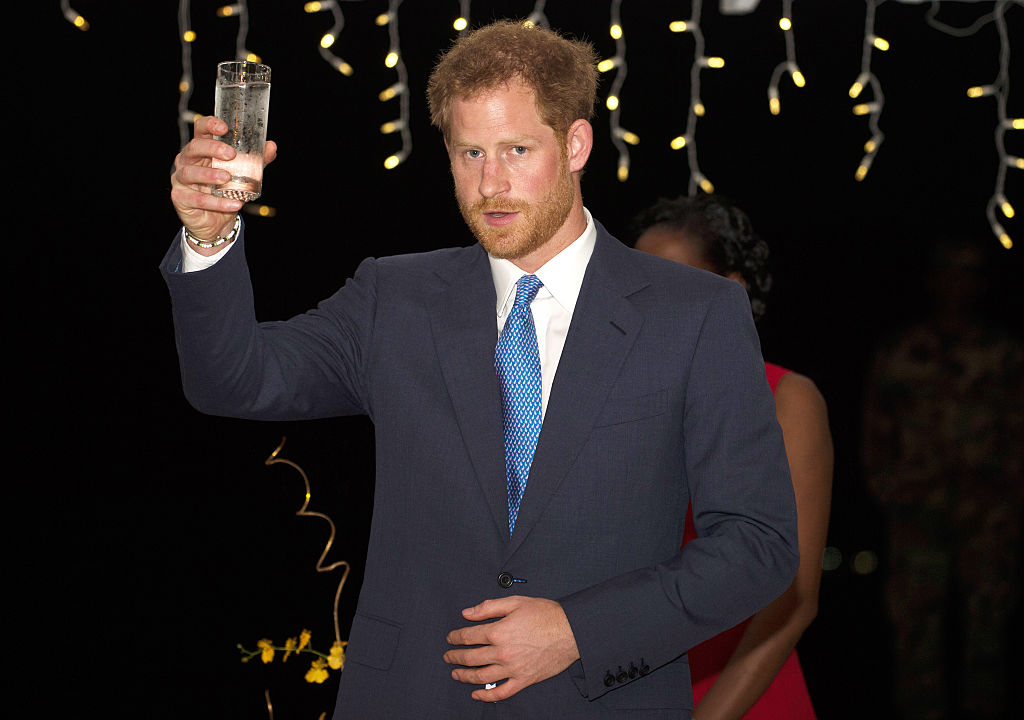 GRAND ANSE BEACH, GRENADA - NOVEMBER 29: Prince Harry speaks at a reception at the Spice Island Beach Resort before attending a reception hosted by the Governor General Her Excellency Dame Cecile La Grenade, on November 29, 2016 in Grenada. Prince Harry's visit to The Caribbean marks the 35th Anniversary of Independence in Antigua and Barbuda and the 50th Anniversary of Independence in Barbados and Guyana. (Photo by Paul Edwards - Pool /Getty Images)