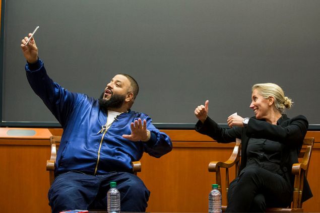CAMBRIDGE, MA - DECEMBER 09: DJ Khaled posts a Snapchat with Harvard Business School Professor of Business Administration, Anita Elberse, during the Get Schooled Snapchat College Tour and Meet at Harvard University on December 9, 2016 in Cambridge, Massachusetts. (Photo by Scott Eisen/Getty Images for Get Schooled Foundation)