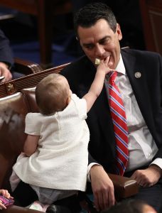 WASHINGTON, DC - JANUARY 03: Rep. Kevin Yoder (R-KS) plays with his daughter during a roll call vote for the election of the Speaker of the House on the floor of the House of Representatives January 3, 2017 in Washington, DC. Seven new members of the U.S. Senate and 52 new members of the House Representatives took their oath of office as the 115th U.S. Congress was seated. (Photo by Win McNamee/Getty Images)