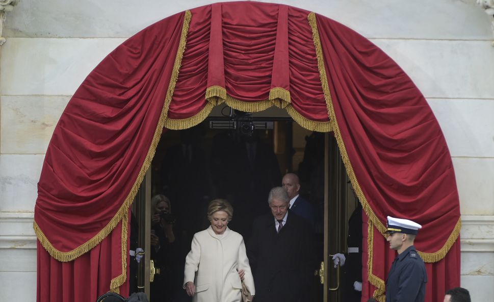 Former President Bill Clinton and former Secretary of State Hillary Clinton step out of the US Capitol for the inauguration of President Donald Trump.