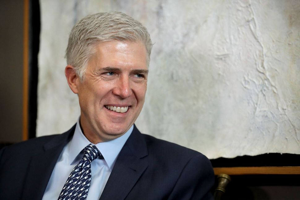 WASHINGTON, DC - FEBRUARY 02: Supreme Court nominee Judge Neil Gorsuch meets with Senate Foreign Relations Committee Chairman Bob Corker (R-TN) in the Dirksen Senate Office Building on Capitol Hill February 2, 2017 in Washington, DC. President Donald Trump nominated Judge Gorsuch to the Supreme Court to fill the seat that had left vacant with the death of Associate Justice Antonin Scalia in February 2016.