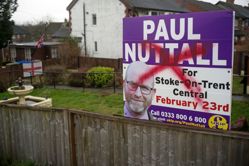 A campaign poster for UKIP candidate Paul Nuttall is defaced in Stoke-on-Trent, England. The city has been dubbed the Brexit capital of Britain after it recorded the highest percentage of 'vote leave' votes in the country.