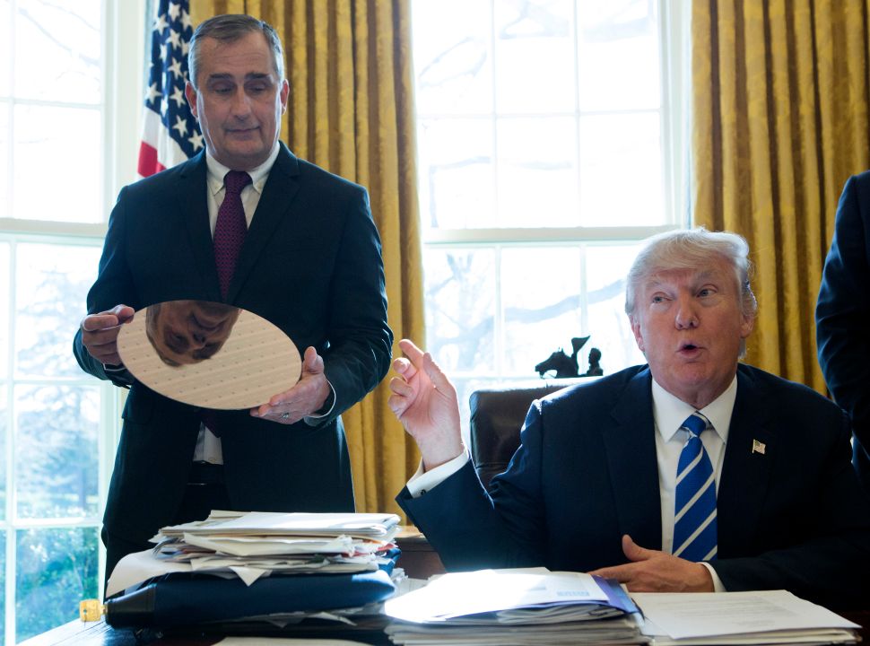 President Donald Trump speaks during a meeting with Intel CEO Brian Krzanich at the White House February 8, 2017. Krzanich announced an investment of $7 billion to build a factory in Chandler, Arizona.