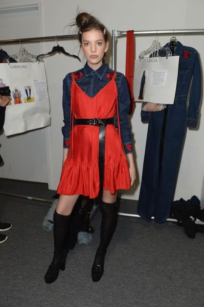 A backstage red moment at Adam Selman.