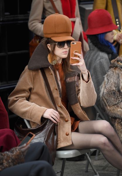 Model Teddy Quinlivan snaps some pics on her iPhone.