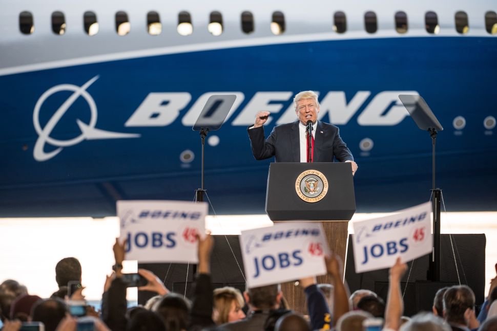 NORTH CHARLESTON, SC - FEBRUARY 17: U.S. President Donald Trump addresses a crowd during the debut event for the Dreamliner 787-10 at Boeing's South Carolina facilities on February 17, 2017 in North Charleston, South Carolina. The airplane begins flight testing later this year and will be delivered to airline customers starting in 2018.