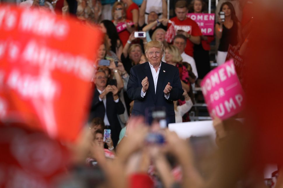 MELBOURNE, FL - FEBRUARY 18: President Donald Trump speaks during a campaign rally at the AeroMod International hangar at Orlando Melbourne International Airport on February 18, 2017 in Melbourne, Florida. President Trump is holding his rally as he continues to try to push his agenda through in Washington, DC.