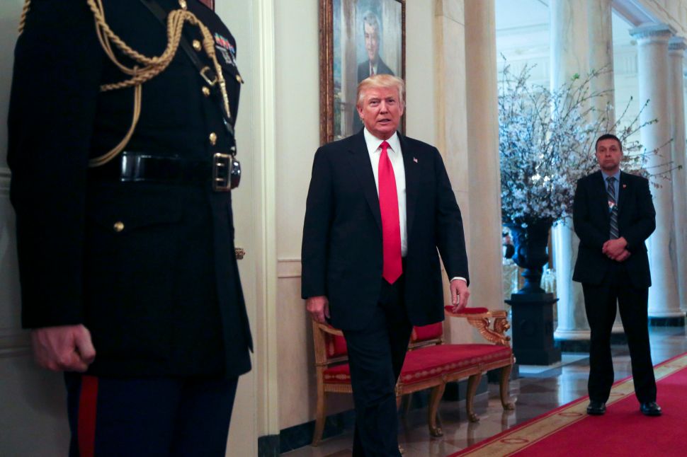 WASHINGTON, DC - FEBRUARY 27: (AFP OUT) U.S. President Donald Trump stops by the National Governors Association meeting in the State Dining Room of the White House February 27, 2017 Washington, DC.