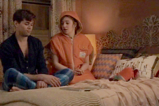 Andrew Rannellis as Elijah Krantz and Lena Dunham as Hannah Horvath.