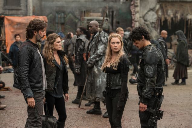 Henry Ian Cusick as Kane, Paige Turco as Abby, Eliza Taylor as Clarke and Bob Morley as Bellamy.