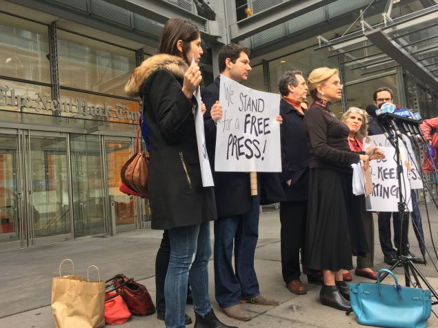 Congresswoman Carolyn Maloney, civil rights attorney Norman Siegel and other lawyers and advocates protest President Donald Trump's attack on reporters in front of the New York Times building.