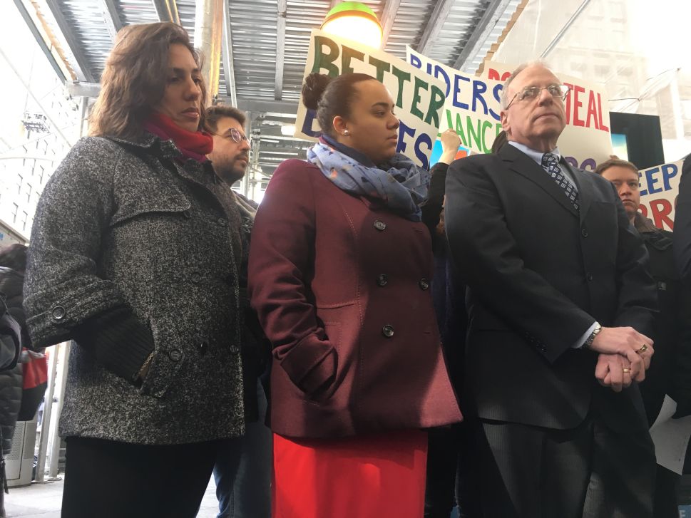 Veronica Vanterpool, executive director of the Tri-State Transportation Campaign; Assemblywoman Carmen de la Rosa; and Assemblyman Jeffrey Dinowitz at a press conference blasting Gov. Andrew Cuomo's MTA budget cut.
