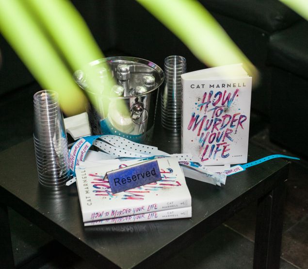 The scene at the 'How To Murder Your Life' party.