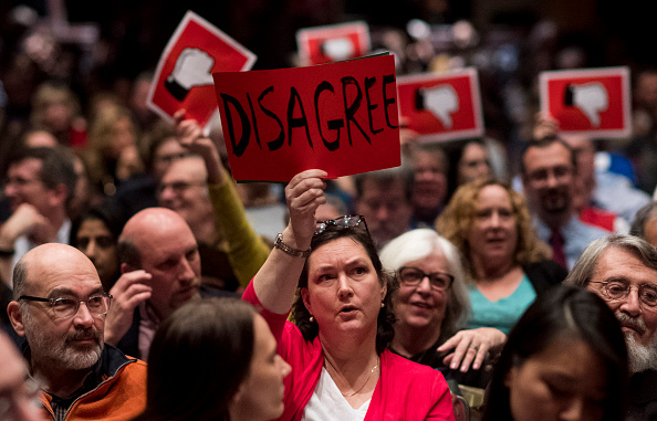 Constituents show their disagreement as Rep. Leonard Lance, R-N.J., answers a question during his town hall meeting at the Raritan Valley Community College in Branchburg, N.J., on Wednesday, Feb. 22, 2017.