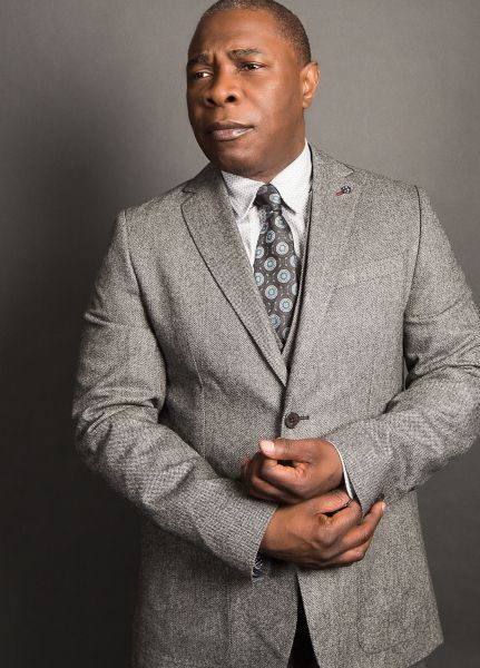 Michael Potts is wearing a Ted Baker suit.