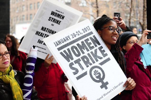 Paulina Davis, vice chairwoman of the New York chapter of the National Women's Liberation and a member of the group's Women of Color Caucus, participating in the Women's March on New York City.