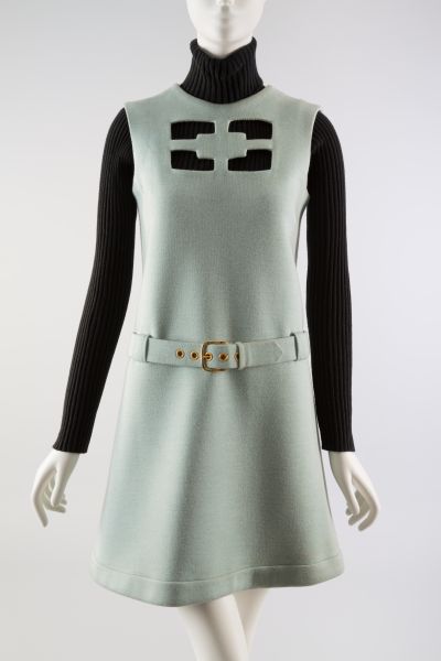 Aqua doubleface wool jersey dress with novelty cut out on chest.