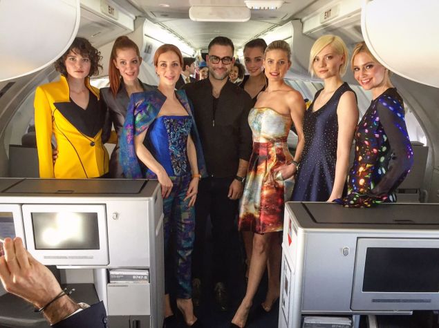 The designer with his models.