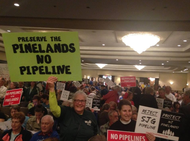 Protesters gather to oppose the proposed natural gas pipeline running through the New Jersey Pine Barrens, which gained approval Friday.