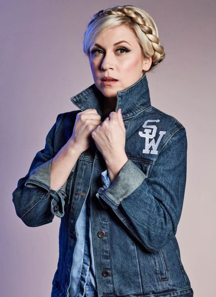 Her Universe Founder Ashley Eckstein wears the new Star Wars "May The Force Be With You" denim jacket which has the famous phrase embroidered on the back. Available at Heruniverse.com.