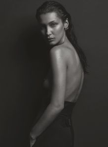Bella Hadid channels Kate Moss in this photograph, in particular.