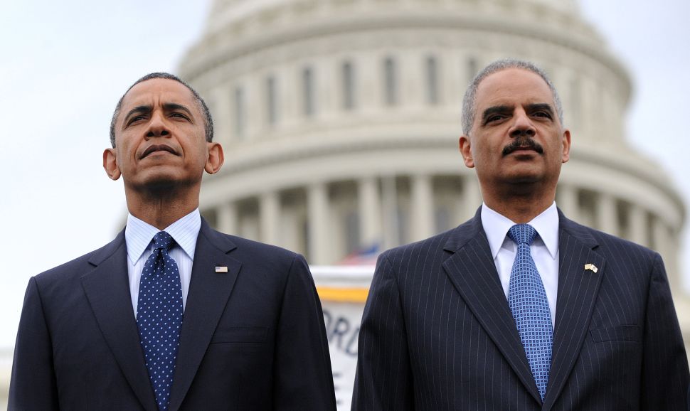 Former President Barack Obama and former Attorney General Eric Holder.