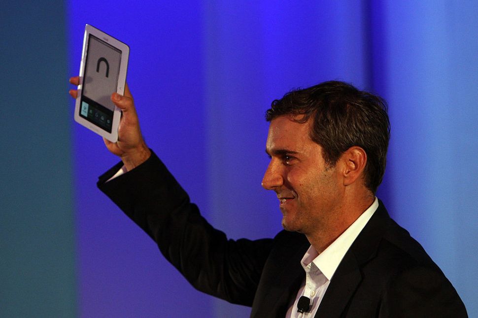 NEW YORK - OCTOBER 20: William Lynch, President of Barnes and Noble.com presents the new "nook" digital reading device on October 20, 2009 in New York City. The "nook" is a wireless reader which will be available on Barnes & Noble's Web site and in stores and is currently available for "pre-order" for $259. The "nook" is less than 5 inches wide and 8 inches tall and weighs 11.2 ounces. At $259 it will be the same price as the recently reduced Kindle by Amazon. (Photo by Spencer Platt/Getty Images)