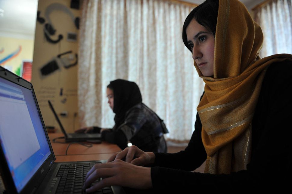 In this picture taken on July 22, 2012, Afghan women use computers at the Young Women For Change internet cafe, Afghanistan's first women-only net cafe, in Kabul. Ten years after the fall of the Taliban, who banned modern technology as un-Islamic, social media in Afghanistan are booming as politicians, warlords -- even the militants themselves -- rush to get their message across.