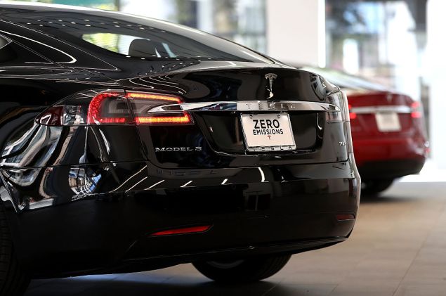 SAN FRANCISCO, CA - AUGUST 10: A Tesla Model S is displayed inside of the new Tesla flagship facility on August 10, 2016 in San Francisco, California. Tesla is opening a 65,000 square foot store, its largest retail center to date. The facility will offer sales and service of Tesla's electric car line. (Photo by Justin Sullivan/Getty Images)