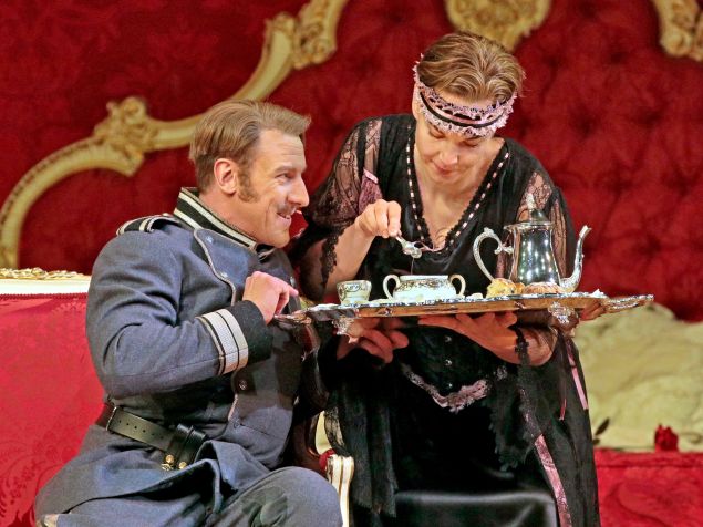 Baron Ochs (Günther Groissböck) gets smooth with drag chambermaid Octavian (Elīna Garanca).