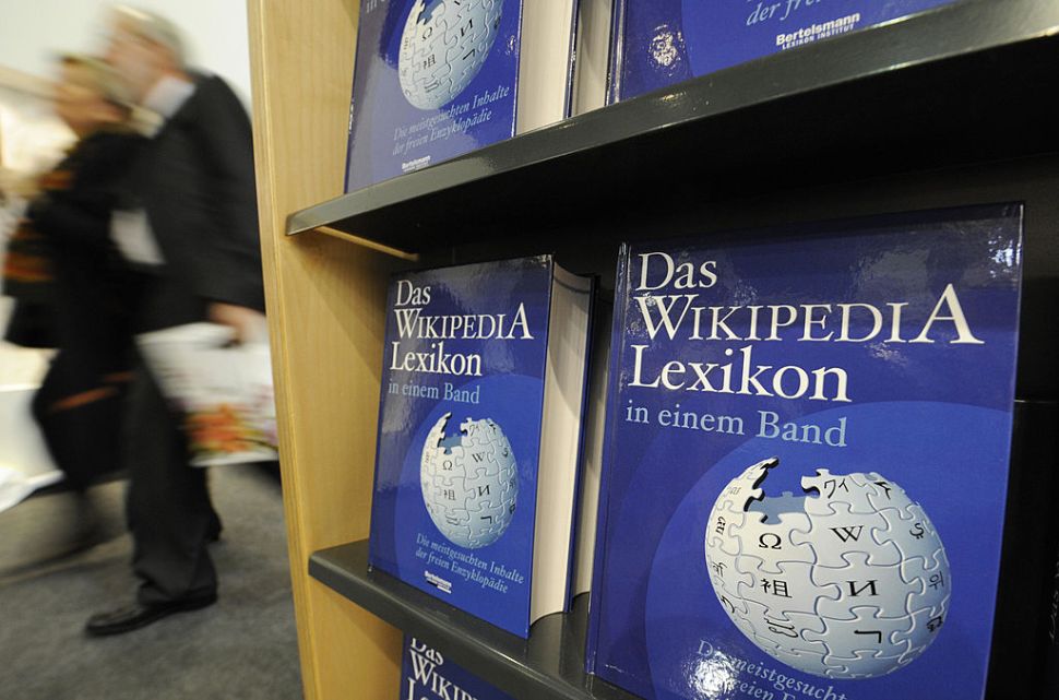 Copies of the "One-Volume Wikipedia Encyclopaedia" are on display at the Frankfurt Book Fair on October 16, 2008. The volume is made up of 50,000 of the most-searched terms on the German language edition of Wikipedia, and represents the first print version of the now-famous online encyclopaedia. Turkey is guest of honour at the 60th edition of the book fair, which takes place from October 15 to 19, 2008. AFP PHOTO / JOHN MACDOUGALL (Photo credit should read JOHN MACDOUGALL/AFP/Getty Images)