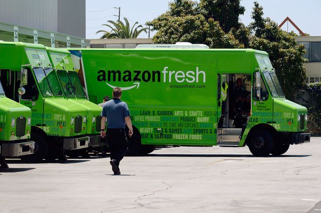 INGLEWOOD, CA - JUNE 27: An Amazon Fresh truck arrives at a warehouse on June 27, 2013 in Inglewood, California. Amazon began groceries and fresh produce delivery on a trial basis to select Los Angeles neighberhoods free of charge for Amazon Prime members. AmazonFresh lets you order groceries and have them delivered on the same day. (Photo by Kevork Djansezian/Getty Images)