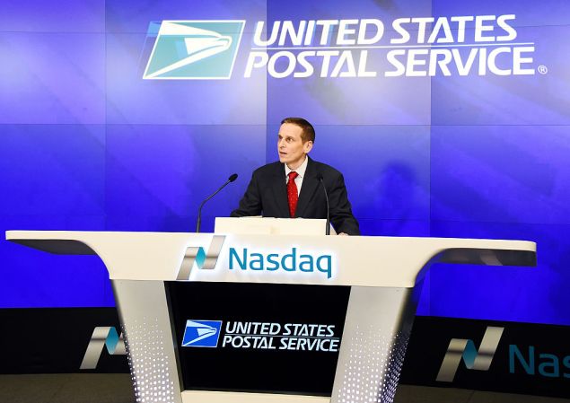 NEW YORK, NY - DECEMBER 22: Members of the "USPS" attends United States Postal Service's Operation Santa To Ring The Nasdaq Stock Market Closing Bell at NASDAQ MarketSite on December 22, 2015 in New York City. (Photo by Nicholas Hunt/Getty Images)