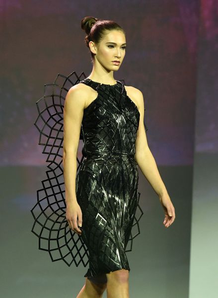 LAS VEGAS, NV - JANUARY 05: A model presents the Chromat Adrenaline Dress made of 3D-printed panels and featuring Intel's Curie Module during a keynote address by Intel Corp. CEO Brian Krzanich at CES 2016 at The Venetian Las Vegas on January 5, 2016 in Las Vegas, Nevada. When the dress senses adrenaline from the wearer, it expands. CES, the world's largest annual consumer technology trade show, runs from January 6-9 and is expected to feature 3,600 exhibitors showing off their latest products and services to more than 150,000 attendees. (Photo by Ethan Miller/Getty Images)