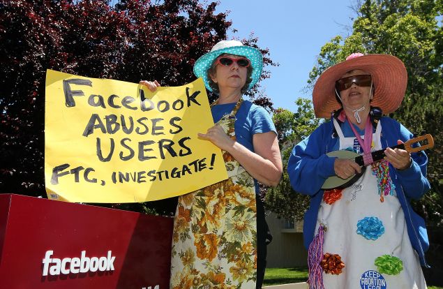 PALO ALTO, CA - JUNE 04: Ruth Robertson (L) and Shirley Powers of the group Raging Grannies stage a demonstration outside of the FaceBook headquarters June 4, 2010 in Palo Alto, California. The group was calling for the FTC to investigate FaceBook's privacy policies. (Photo by Justin Sullivan/Getty Images)