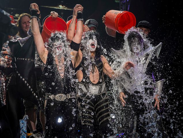 NOBLESVILLE, IN - AUGUST 22: Eric Singer, Paul Stanley and Tommy Thayer of the band KISS participates in the ALS Ice Bucket Challenge at Klipsch Music Center on August 22, 2014 in Noblesville, Indiana. (Photo by Michael Hickey/Getty Images)