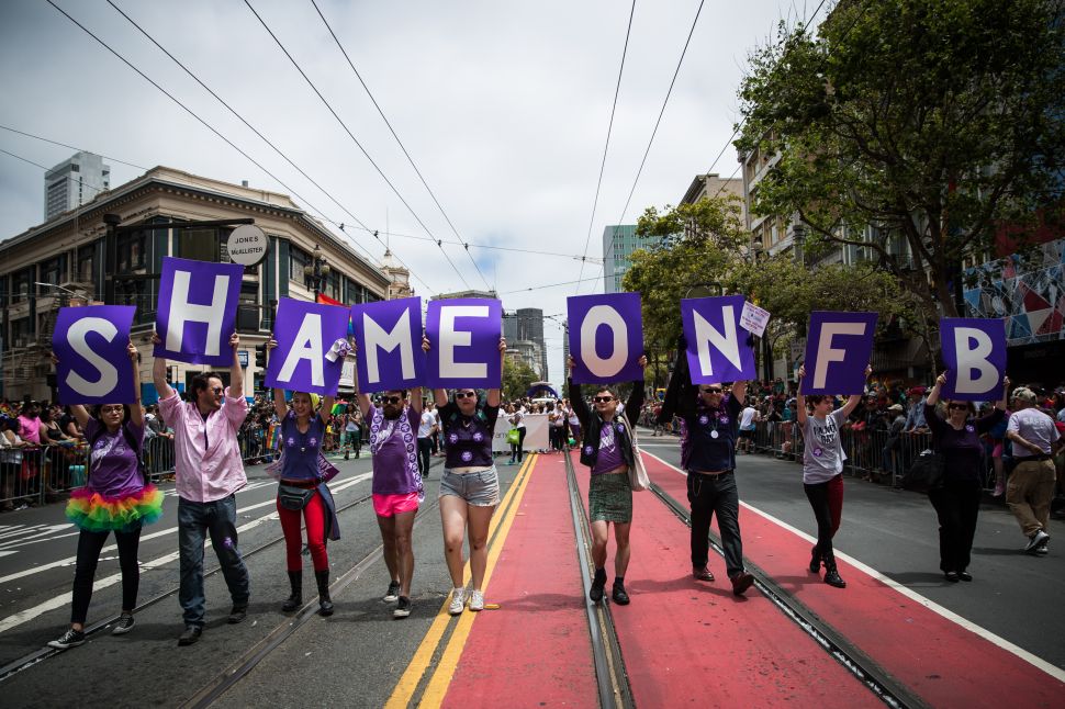 SAN FRANCISCO, CA- JUNE 28: San Francisco Gay Pride Parade marchers protest Facebook not allowing transgender people from choosing their own name, rather than birth name on the social networking site, June 28, 2015 in San Francisco, California. The 2015 pride parade comes two days after the U.S. Supreme Court's landmark decision to legalize same-sex marriage in all 50 states. (Photo by Max Whittaker/Getty Images)