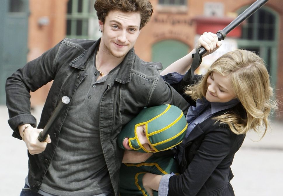 BERLIN - MARCH 30: Actor Aaron Johnson, superhero character and actress Chloe Moretz attend the photocall of 'Kick-Ass' at Kulturbrauerei on March 30, 2010 in Berlin, Germany. (Photo by Florian Seefried/Getty Images)