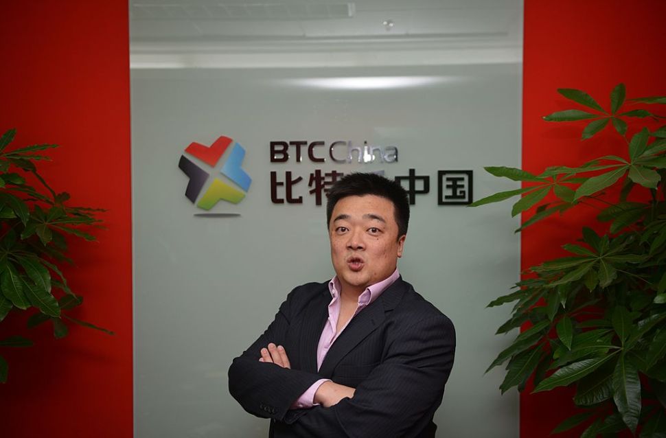 Photo taken on December 4, 2013 shows Bobby Lee, CEO and Co-Founder of BTC China, China's bitcoin exchange at his office in Shanghai. Chinese investors are pouring billions into the virtual Bitcoin currency, driving its price to almost the level of an ounce of gold, but stoking fears of a huge and unsustainable bubble. AFP PHOTO/Peter PARKS (Photo credit should read PETER PARKS/AFP/Getty Images)