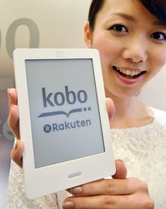 A model displays top Japanese online retailer Rakuten new electronic book player "Kobo Touch" with a six-inch e-ink display in Tokyo on July 2, 2012 produced by Rakuten-owned Canadian popular ebook maker Kobo. Rakuten will launch an ebook service in the nation's largely untapped market on July 19, releasing the Kobo Touch reading device exactly at 100 USD.