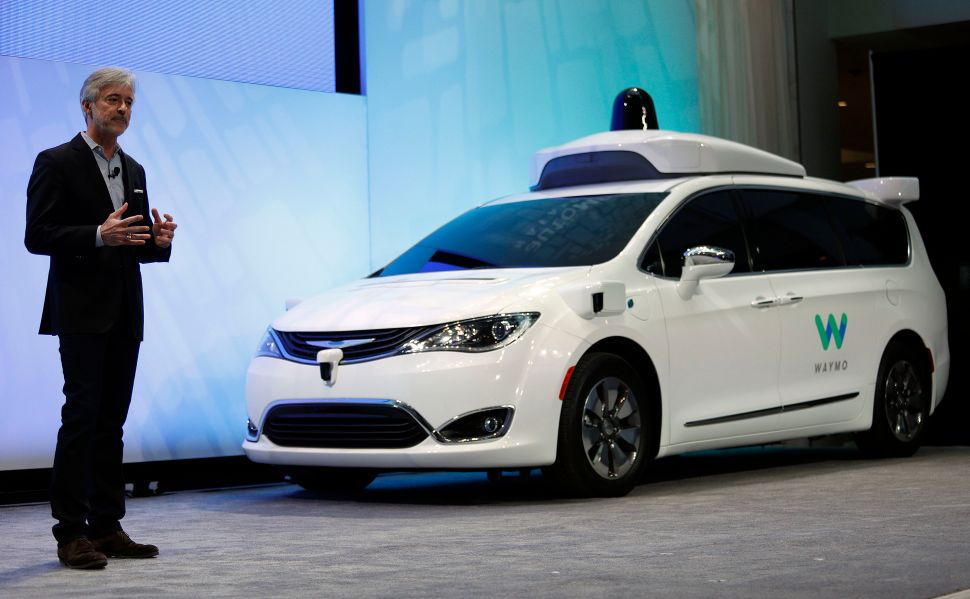 DETROIT, MI - JANUARY 8: John Krafcik, CEO of Waymo, debuts a customized Chrysler Pacifica Hybrid that will be used for Google's autonomous vehicle program at the 2017 North American International Auto Show on January 8, 2017 in Detroit, Michigan. Approximately 5000 journalists from around the world and nearly 800,000 people are expected to attend the NAIAS between January 8th and January 22nd to see the more than 750 vehicles and numerous interactive displays. (Photo by Bill Pugliano/Getty Images)