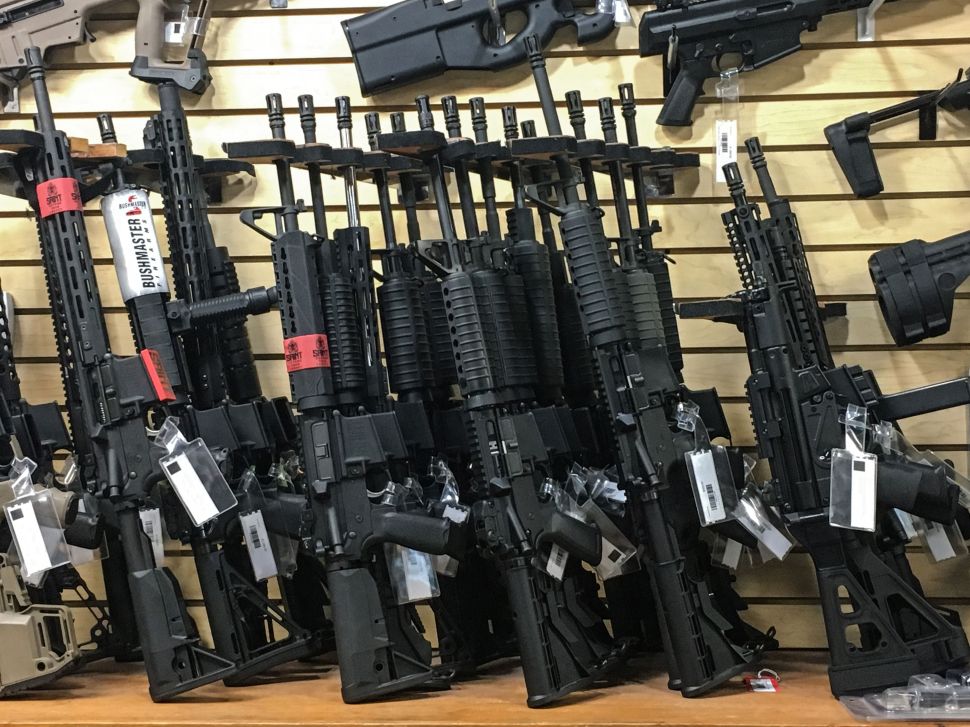 Semi-automatic rifles are seen for sale in a gun shop in Las Vegas, Nevada on Oct. 4, 2017.