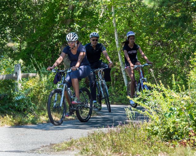 And here the Obamas are on a casual bicycling ride in Martha's Vineyard.